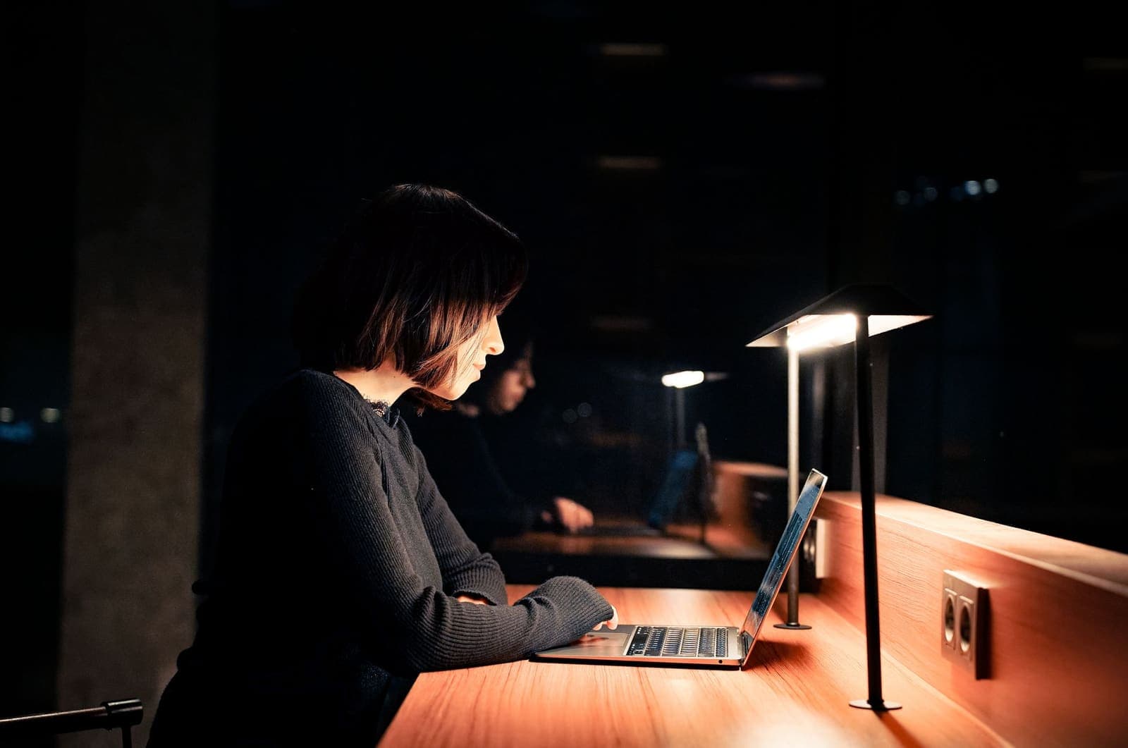 A quiet, minimalist workspace with natural light and no distractions, set up for focused work